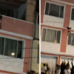 Video: un bambino di 2 anni sospeso in aria salvato dai vicini nella parte inferiore dell'edificio


